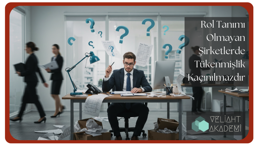 Rol tanımı olmayan şirketlerde, masasında evrak ve sorularla bunalmış çalışanı gösteren ofis görseli